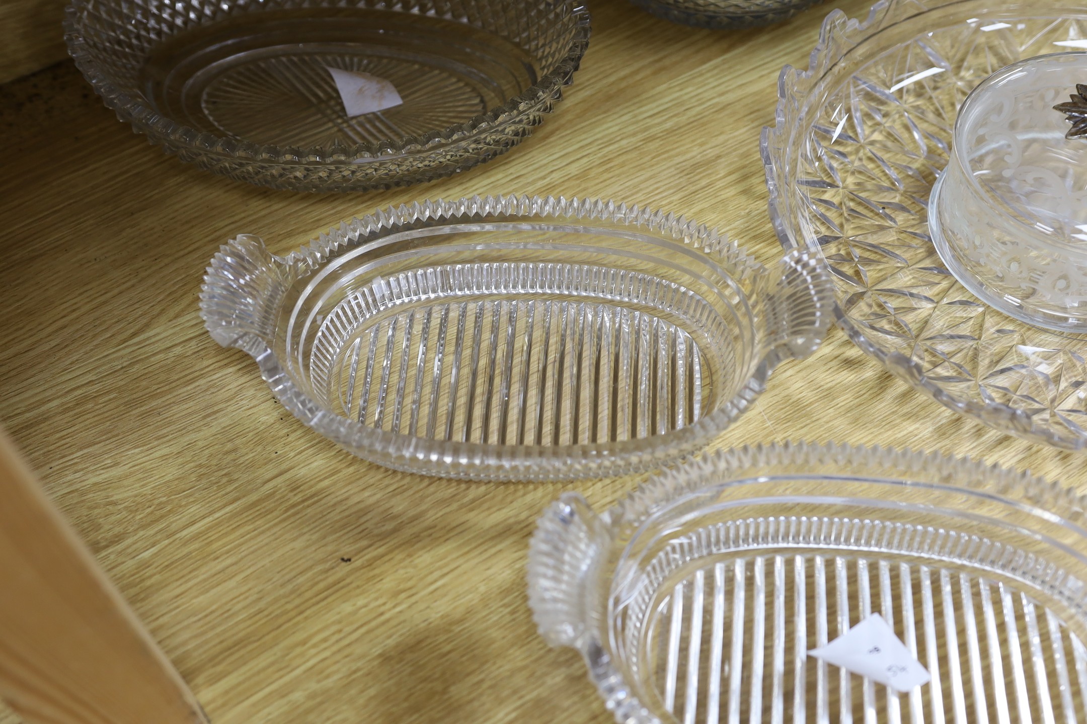 A selection of various late Georgian cut glass dishes, and a later silver mounted pineapple lidded pot and others